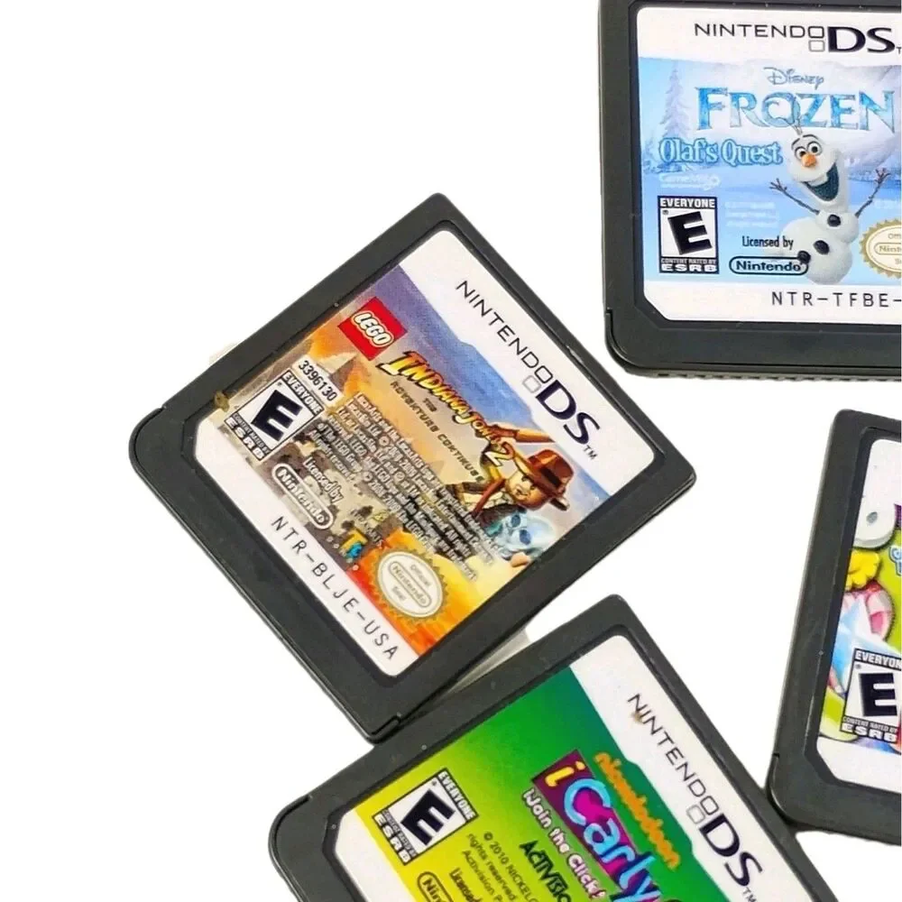 Nintendo DS Game Lot of 4 - Frozen, LEGO Indiana Jones, iCarly 2, Candy Factory